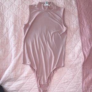 mauve pink mock neck body suit